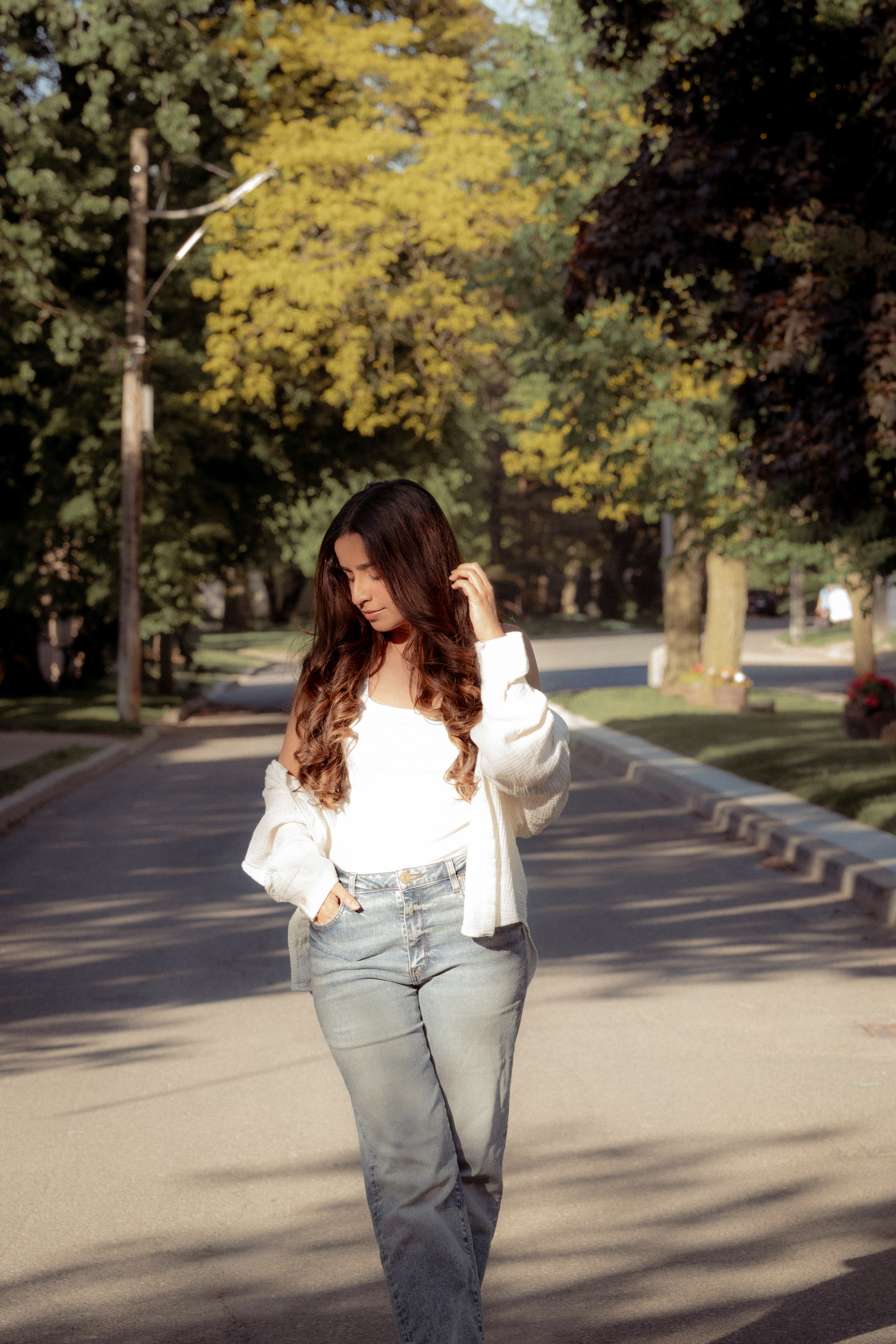 Portrait walking along a sunlit path